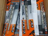several different types of batteries in a cardboard box on a table
