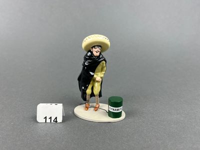 a figurine of a man with a hat and a cane