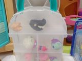 a lot of littlest pet shop toys on the table