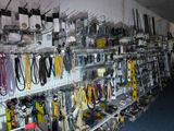 many different types of tools on the wall in the store