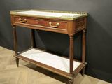 an image of a wooden table with a marble top on a wooden floor