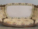 a couch that is sitting on the floor in a room