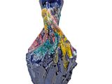 a blue vase with a multicolored design on it