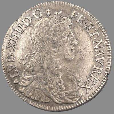 une pièce d'argent portant une tête de femme et une couronne