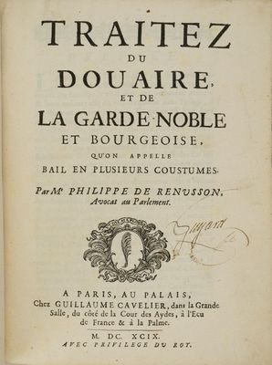 un vieux livre dont la couverture est ornée d'une image de cheval