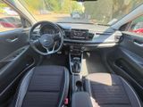 the interior of a car with a dashboard and a steering wheel