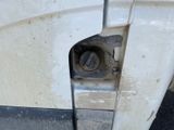 a close up of a door handle on a truck
