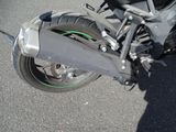 a motorcycle that is parked on the side of the road