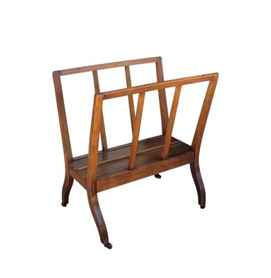a wooden magazine rack with a magazine holder on it