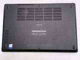 a black laptop with a blue sticker on it