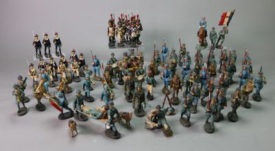 a lot of figurines that are sitting on a table
