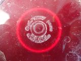 a red frisbee that is sitting on a table