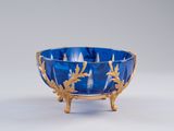 an image of a blue bowl with gold decoration on it