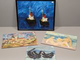 trois tableaux représentant des bateaux et un bateau posé sur une table