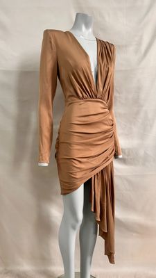 a mannequin wearing a brown dress on a mannequin mannequin