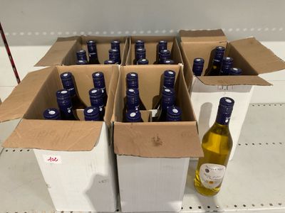 bottles of wine are in boxes on a shelf in a store