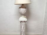 a lamp that is sitting on top of a wooden table