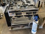 a stove that has a lot of tools on top of it