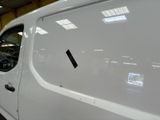 a white van that is parked in a garage