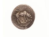 une image représentant une pièce d'argent sur laquelle figure un cheval