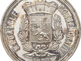 gros plan d'une pièce de monnaie surmontée d'une couronne