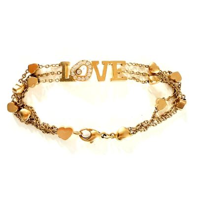 gold tone love bracelet with heart charms