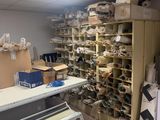 a room with a lot of boxes and a printer