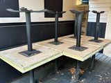 two tables that are set up on the porch
