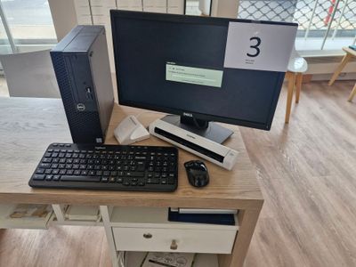 a desktop computer sitting on a desk with a keyboard and mouse