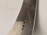 a knife that is sitting on top of a table