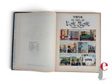 an open book with a picture of a train on it
