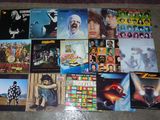 the album covers of the albums are arranged on the floor