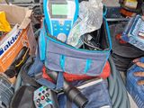 a pile of tools that are sitting on the floor