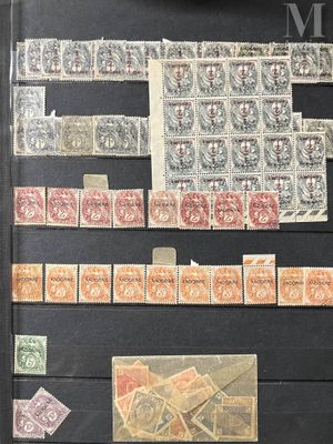 an old collection of stamps and stamps on display in a glass case