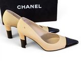 chanel beige and black leather pumps