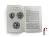 an open book with a picture of a seal on the inside of it