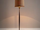 a lamp that is sitting on a table with a lamp on it