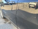 a reflection of a car on the side of the road