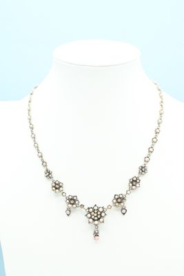 a white mannequin necklace on a mannequin mannequin mannequin mannequin mannequin mannequin mannequin mannequin