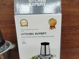 packaging of a kitchen expert blender sitting on a wooden table