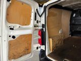 a white van with the door open and the back door open