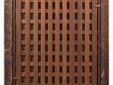 an image of a wooden door with a lattice pattern on it