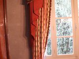 a chair in front of a window in a room
