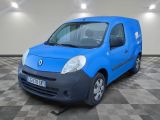 a picture of a blue van parked in a garage