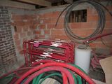 a room with a lot of hoses and a fire hydrant