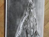 an image of a black and white photo of a person standing in the snow