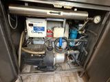 a machine that is sitting in the corner of a room