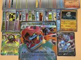 beaucoup de cartes pokemon sur la table