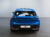 the rear view of a blue car in a showroom