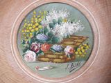 a painting of a basket of flowers on a table